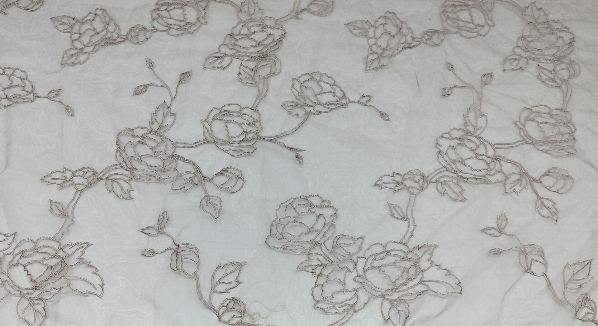 white colored embroidery flower design